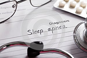 Diagnosis Sleep Apnea Word On Paper With Drugs And Stethoscope