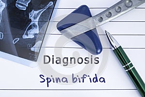 Diagnosis of Spina Bifida. Medical health history written with diagnosis of Spina Bifida, MRI image sacral spine and neurological photo