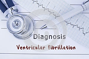 Diagnosis Ventricular fibrillation. Stethoscope or phonendoscope with ECG lie on medical history with title diagnosis Ventricular