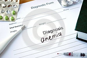 Diagnostic form with Diagnosis anemia . photo