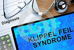 Diagnostic form with diagnosis Klippel Feil syndrome and pills.