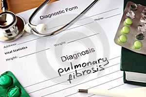 Diagnostic form with diagnosis pulmonary fibrosis. photo