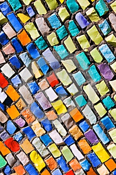 Diagonal colorful mosaic texture on wall