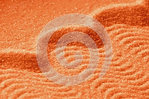 Diagonal composition of sand waves, bright orange tone image