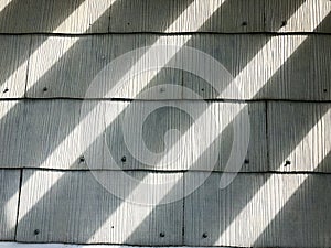 Diagonal Light and Dark Shadow Pattern on Old Wooden Shingles