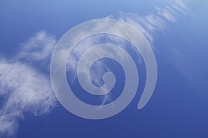 Diagonal line pattern abstract nature of white clouds and blue sky background