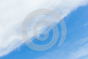 Diagonal line pattern abstract nature of white clouds and blue sky background