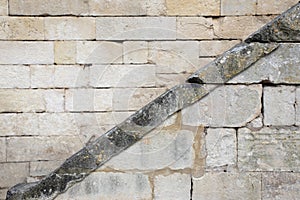 Diagonal line on a stone wall