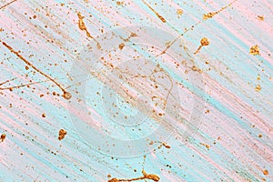 Diagonal pink and blue background with Random gold paint splashes. Place for your design