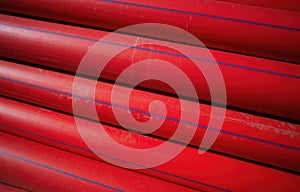 Diagonal red construction water pipes background