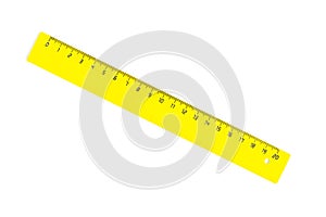 Diagonal yellow twenty centimetres ruller isolated