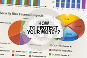 On diagrams and graphs lies torn paper with the inscription - How to protect your money