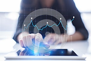 Diagrams and graphs on virtual screen. Business strategy, data analysis technology and financial growth concept.