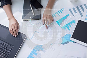 Diagrams and graphs on virtual screen. Business strategy, data analysis technology and financial growth concept.