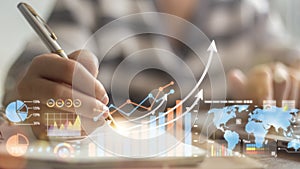 Diagrams and graphs on virtual screen. Business strategy, data analysis technology and financial growth concept