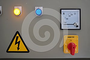 The dial of the ammeter on the indoor electrical control panel.