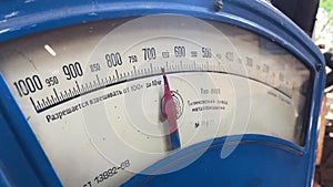 Dial of old antique scales. Bar and arrow during weighing