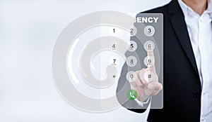 Dialing on virtual telephone keypad with transparent telephone buttons, businessman touch button of telephone number on screen, Fi