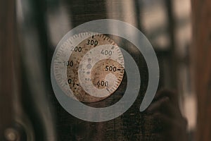 The dials of the old antique classic clocks on a vintage paper background. Concept of time, history, science, memory, information.