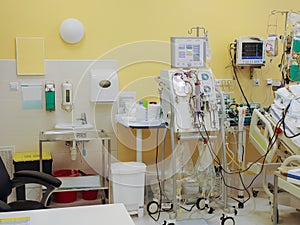 Dialysis machine, to which patient is connected in intensive care unit in hospital. The patient fell ill with a new type of