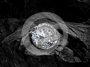 Diamond on black coal background