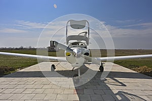 A Diamond DA-40 Diamond Star private small plane after the end of the flight near the parking hangar