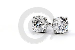 Diamond earrings. Big diamond earrings luxury jewellery on white background.