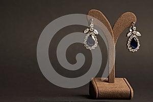 Diamond earrings with sapphires.