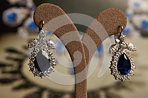 Diamond earrings with sapphires.