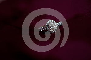 Diamond Engagement Ring on Red photo