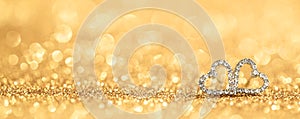 diamond hearts on gold bokeh background