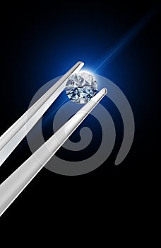 Diamond held by tweezers