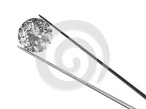 A diamond held in tweezers