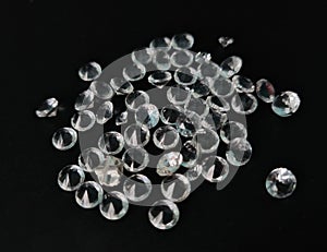 Diamond isolated on black background. Round brilliant cut