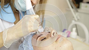 Diamond microdermabrasion, peeling treatment at cosmetic beauty spa clinic. woman getting a vacuum microdermabrasion