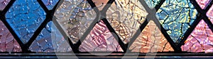 Diamond-patterned stained glass diffuses ethereal light