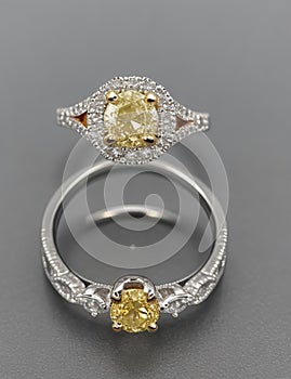 Diamond ring. Diamond ring with topaz isolated on white background. Ring with diamonds and large topaz.