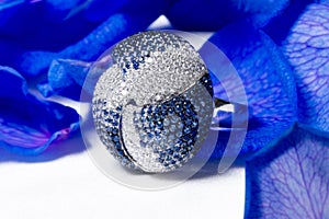 Diamond ring between the petals