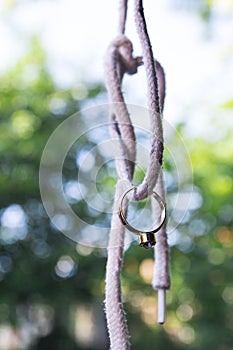 Diamond ring on a shoelace