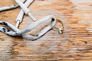 Diamond ring on a shoelace