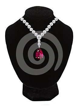 Diamond and ruby necklace on black mannequin isolated on white