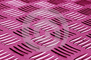 Diamond shaped metal floor pattern with blur effect in pink tone