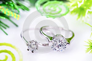 Diamond wedding rings on white background