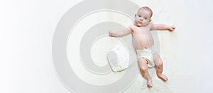 Diaper baby newborn child banner. Child care white background. Happy cute infant baby in nappy. Concept of childhood