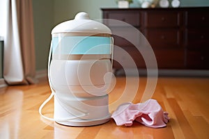 diaper pail with a lid to keep odors contained photo