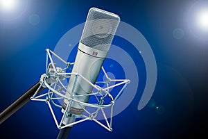 Diaphragm condenser studio microphone on dark backdrop, 3D rendering