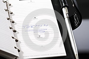 Diary and ball pen, close-up