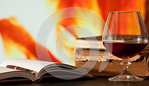 Diary and brandy glass
