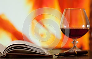 Diary and brandy glass