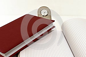 Diary organiser, ballpoint pen and table clock